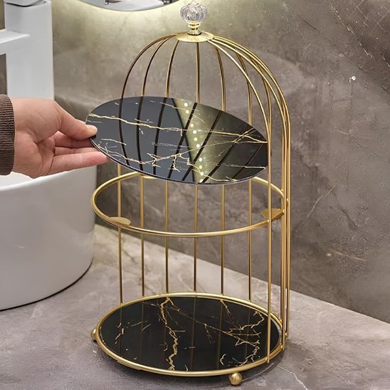 Organisateur maquillage plateau noir, surface métallique design élégant style cage à oiseau dorée 