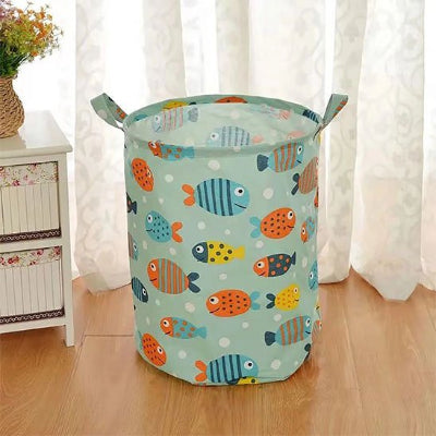 Panier à linge en tissu bleu clair motifs poissons coton et lin rond pliable 
