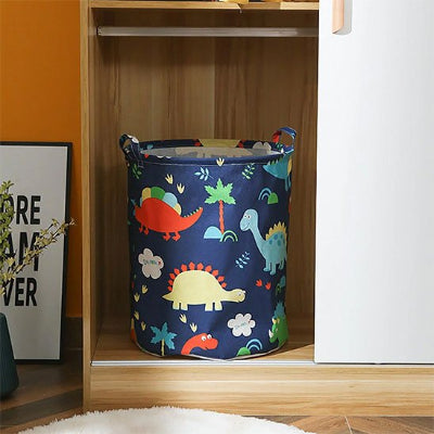 Panier à linge en tissu motif dinosaures rond bleu foncé