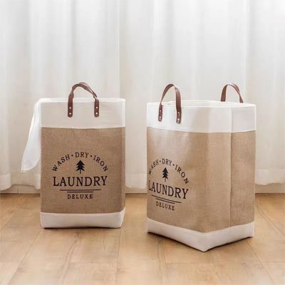 Panier à linge beige et blanche en coton 