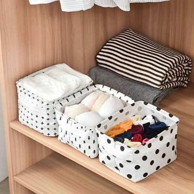 paniers de rangement blancs motifs pois noirs croix sapin