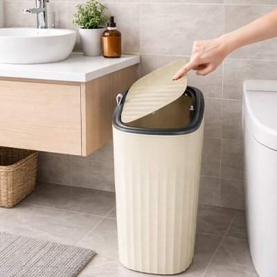 poubelle de salle de bains à anneau de presse de forme étroite avec couvercle rose pâle 