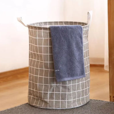 sac pour linge sale gris quadrillée cylindrique avec poignée