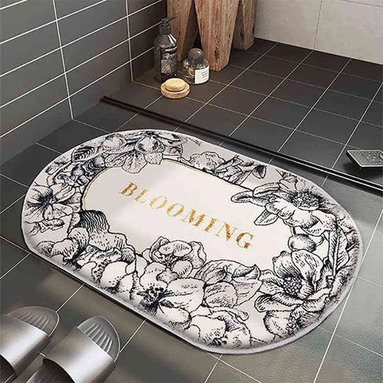 Tapis salle de bain ovale avec motifs fins noir sur blanc