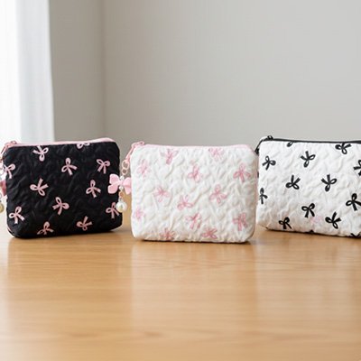 Trousse de toilette en coton matelassé en motif petit nœud