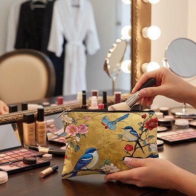 Trousse de toilette femme ton doré légère et pliable en tissu à motif d'oiseau floral pour maquillages