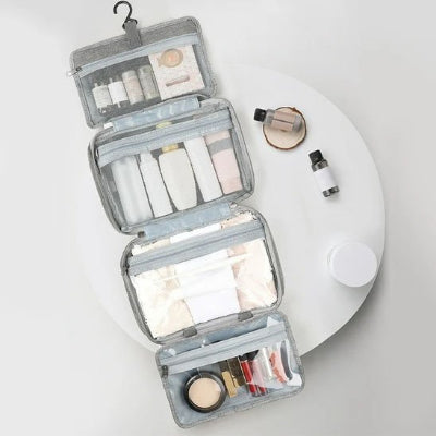 Trousse de toilette grise à suspendre avec plusieurs compartiments