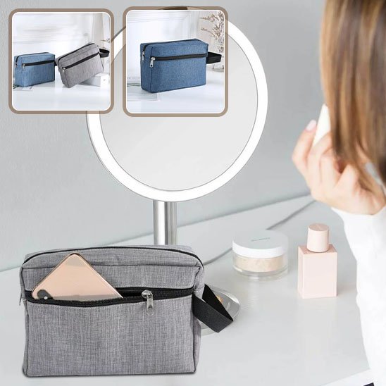 Trousse de toilette grise ou bleu à la fermeture éclair noire de forme rectangulaire 