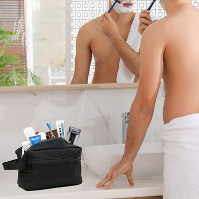 Trousse de toilette homme noire avec fermeture éclair noire et poche latérale et sangle de portage
