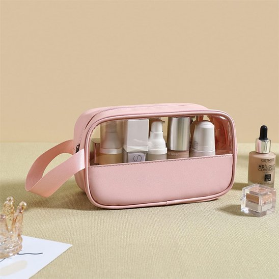 Trousse de toilette rose avec poignée latérale et fenêtre trasnparente